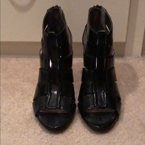 Calvin Klein black heels that zip up in the back.